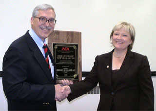 Dr. Cramer accepting the ACA Researcher of the Year award.