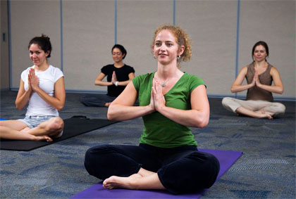 Students practicing yoga